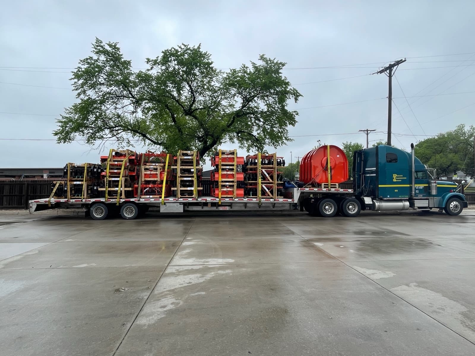 Mobile diesel mechanic servicing a tractor-trailer on-site in Lincoln, Nebraska